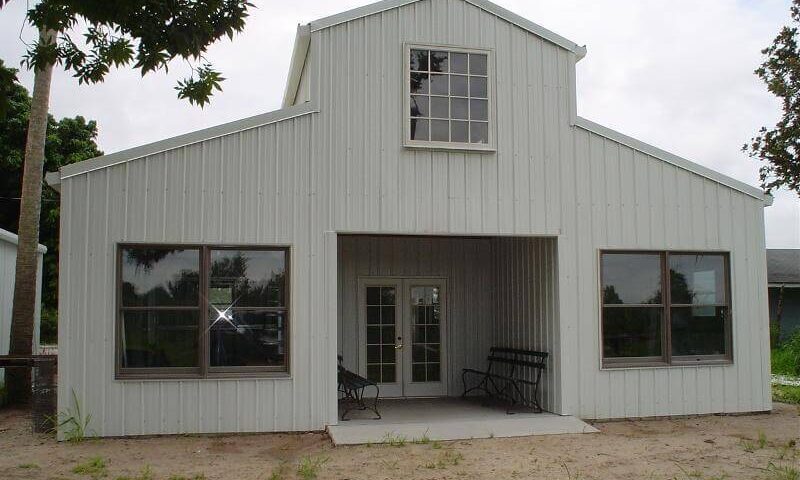 Image of bolt up galvanized steel barndominiums in Tucson, Arizona under a bright blue sky