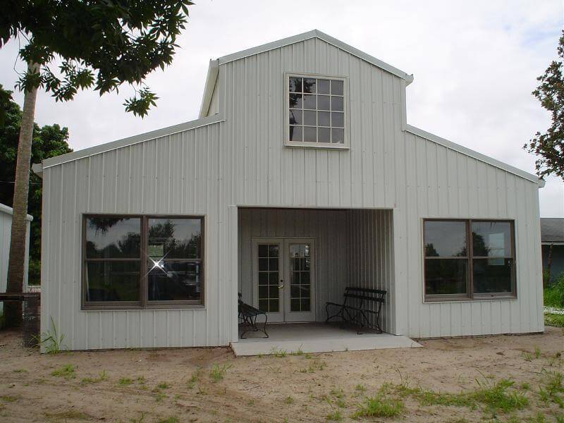 Image of bolt up galvanized steel barndominiums in Tucson, Arizona under a bright blue sky