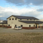 Galvanized steel barndominiums with living space in Scottsdale, Arizona, offering modern amenities and rustic charm