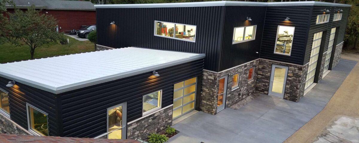 View of galvanized steel barndominiums in Rio Rico, Southeast Arizona, showcasing modern design and rural beauty