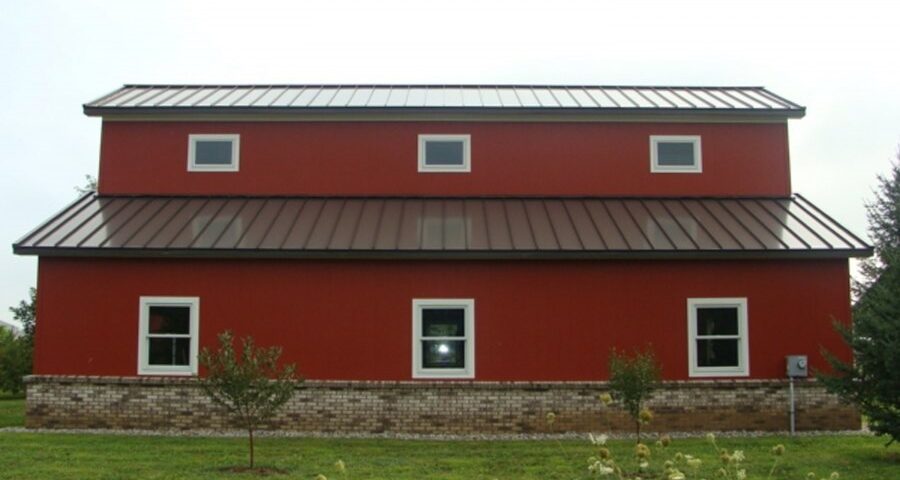 Newly built galvanized steel barndominiums in Sahuarita, Arizona showcasing modern architecture and sturdy design