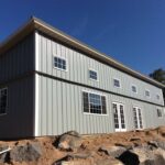 Charming galvanized steel barndominiums in Williamson, Arizona, showcasing modern design and rustic appeal